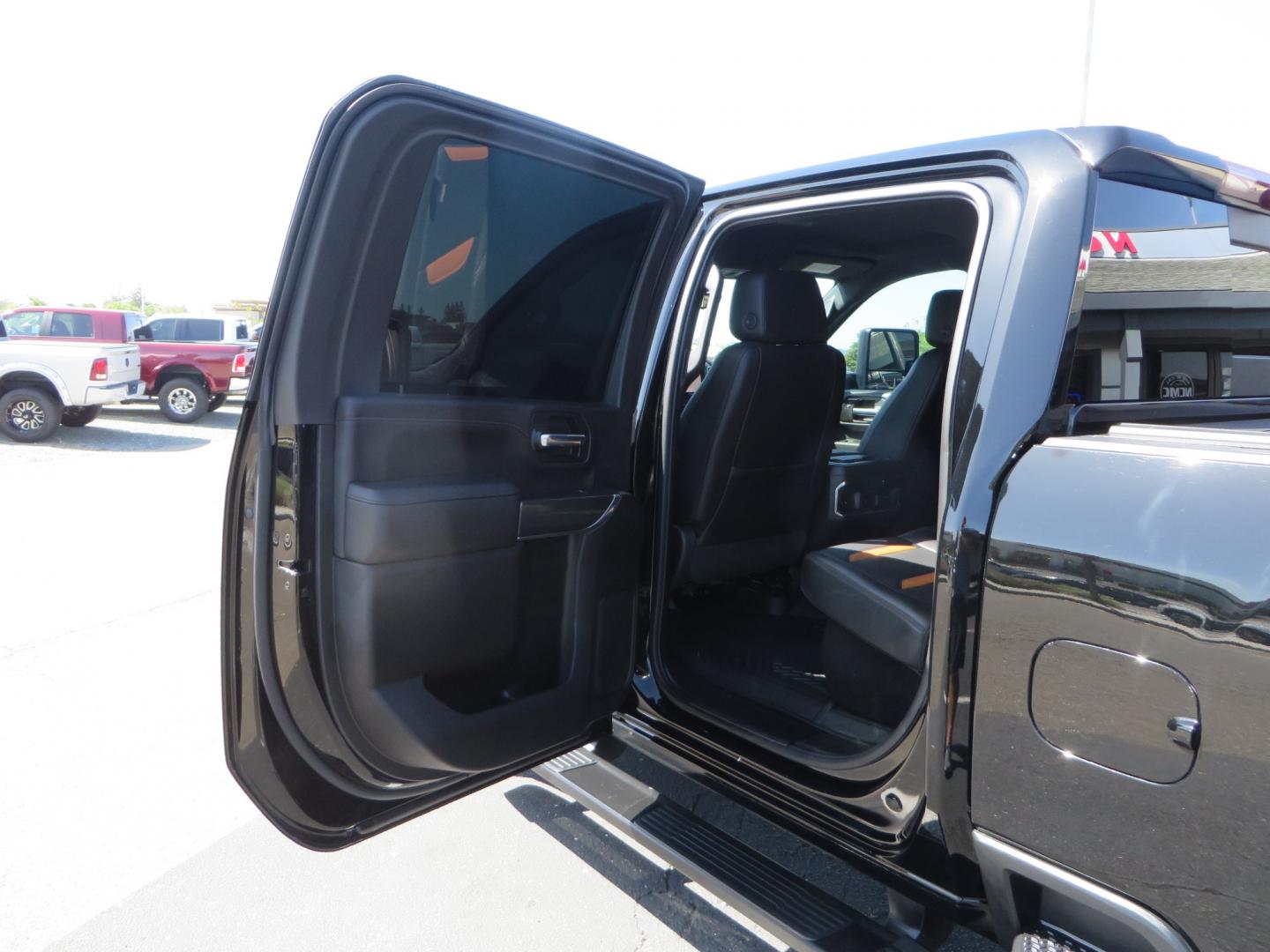 2020 BLACK /BLACK GMC Sierra 2500HD AT4 (1GT49PE76LF) with an 6.6L V8 engine, automatic transmission, located at 2630 Grass Valley Highway, Auburn, CA, 95603, (530) 508-5100, 38.937893, -121.095482 - Features a 3" BDS level kit with Fox shocks, 35" Toyo RT trail tires, 17" Method race wheels, JL audio Subwoofer, Window tint, and a power Tonneau cover. - Photo#29